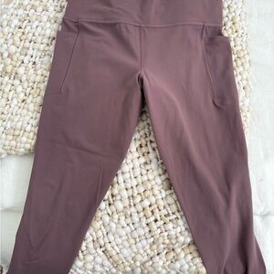 Athleta Mauve salutation stash 7/8 Leggings with Pockets